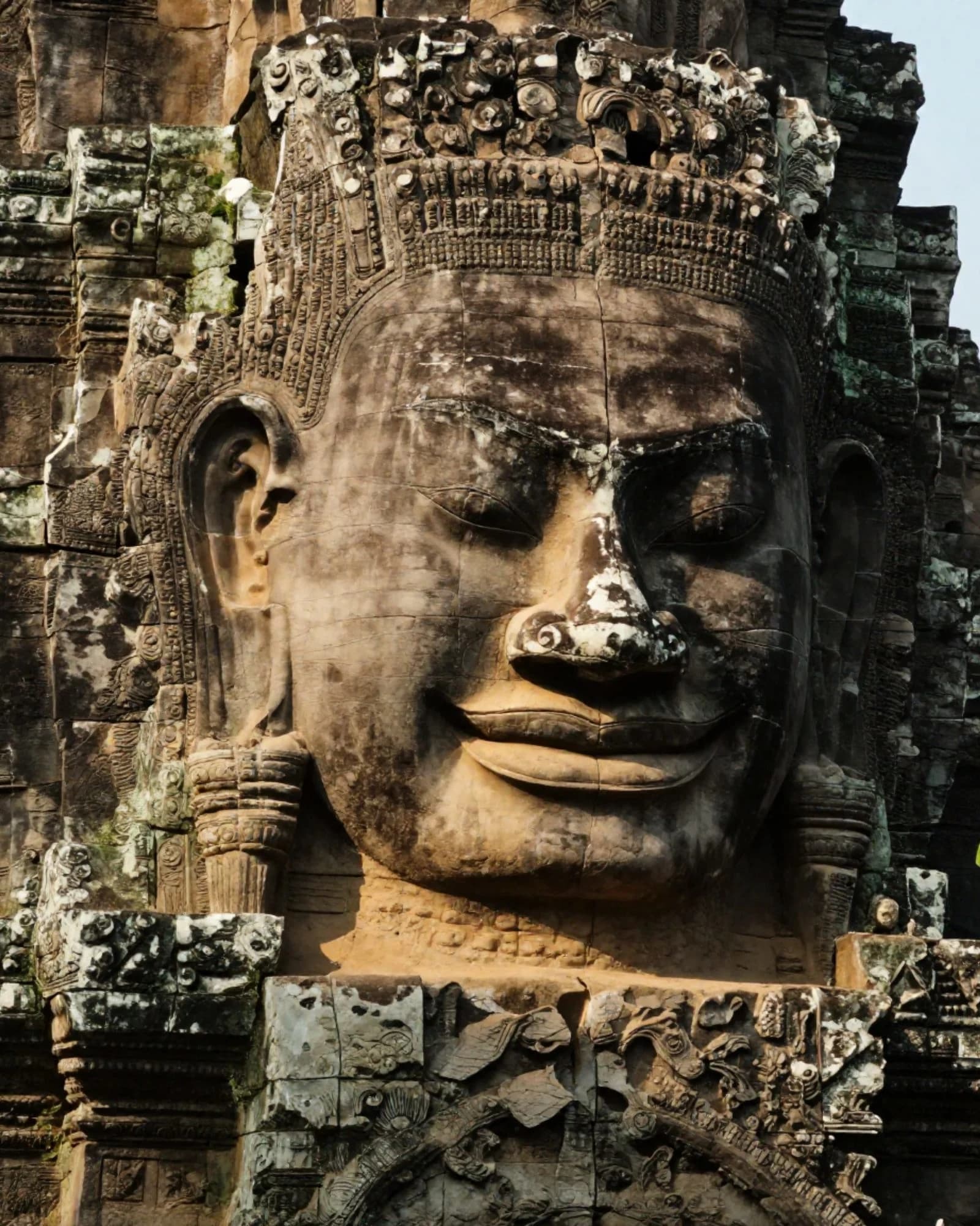 One of Bayon’s giant stone faces, serene and half-smiling